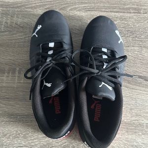 Out of box Puma, size 11, black, running shoe.